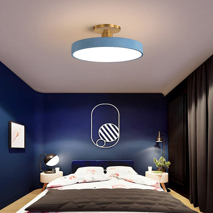 Round LED ceiling light with acrylic shade for living and bedroom spaces