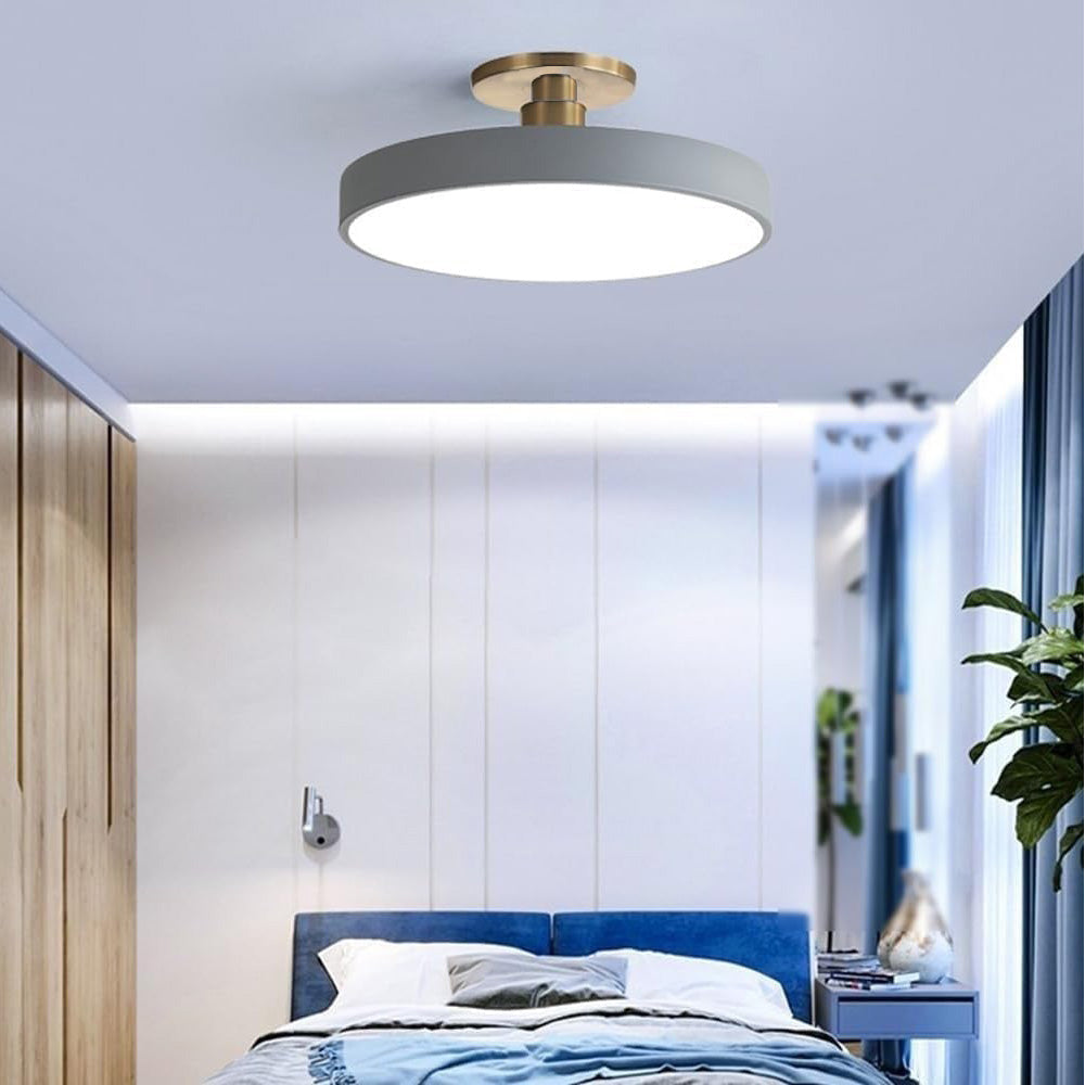Round LED ceiling light with acrylic shade for living and bedroom spaces