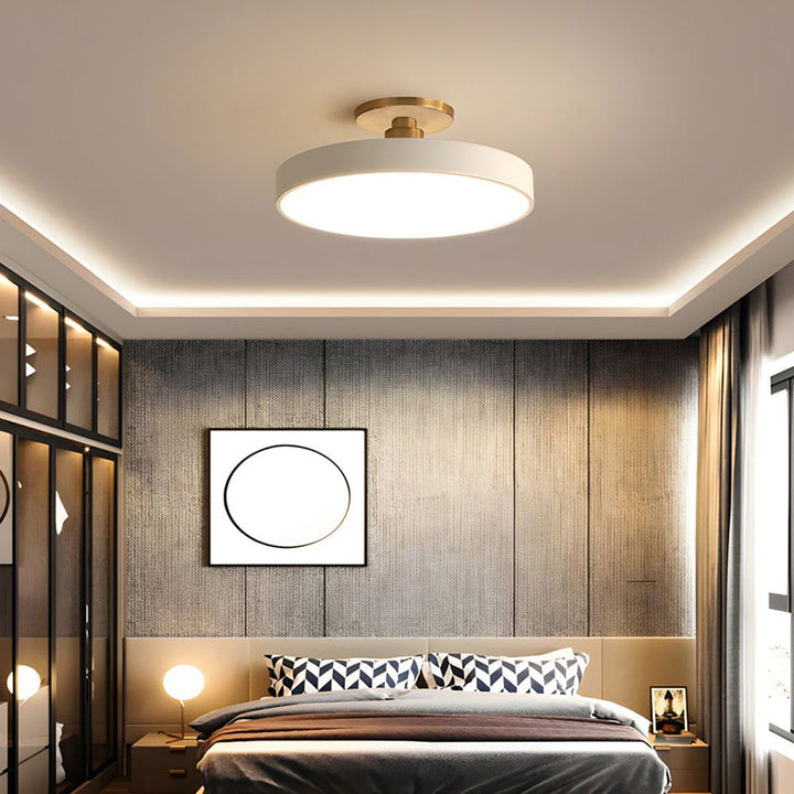 Round LED ceiling light with acrylic shade for living and bedroom spaces