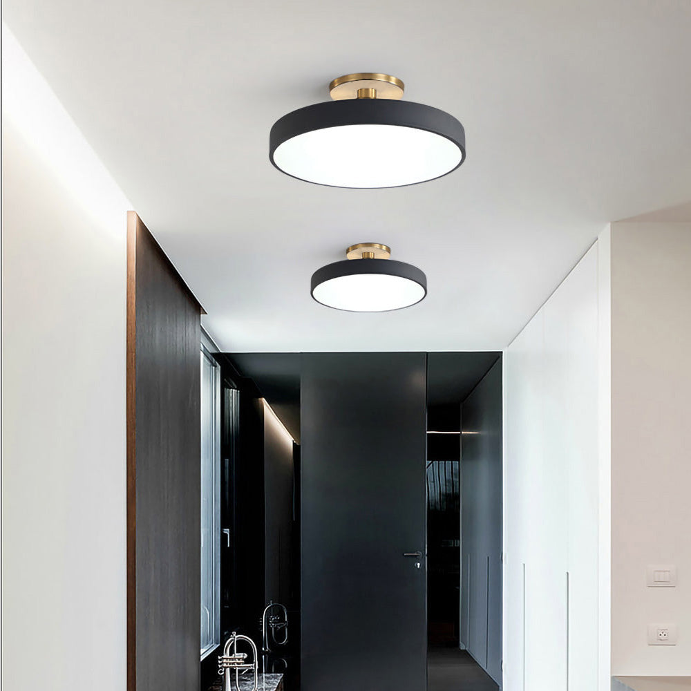 Round LED ceiling light with acrylic shade for living and bedroom spaces