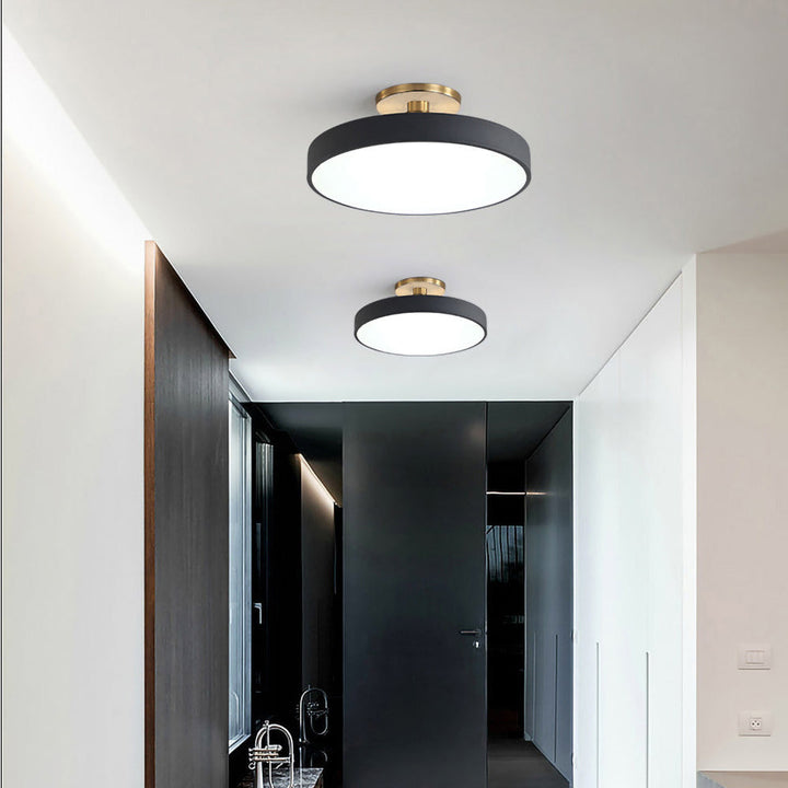 Round LED ceiling light with acrylic shade for living and bedroom spaces