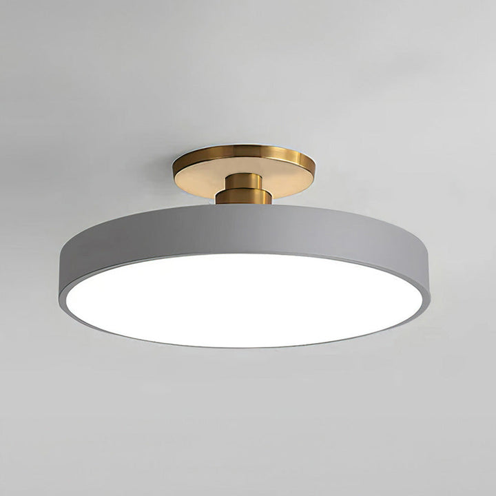 Round LED ceiling light with acrylic shade for living and bedroom spaces
