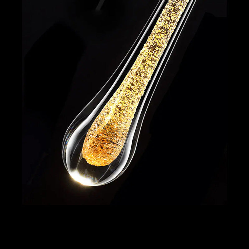 Glass water-drop LED wall light with gold accents