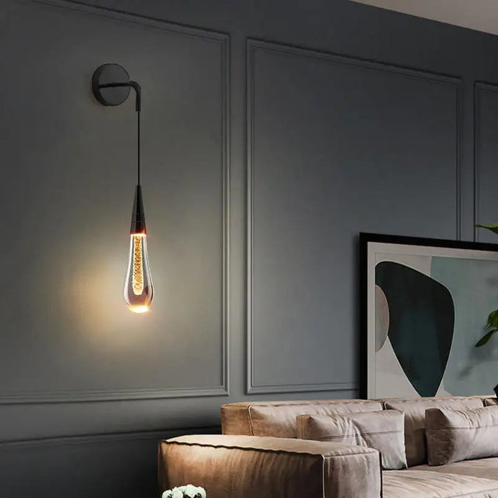 Elegant glass wall light with gold water-drop design
