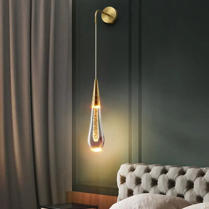 Elegant glass wall light with gold water-drop design