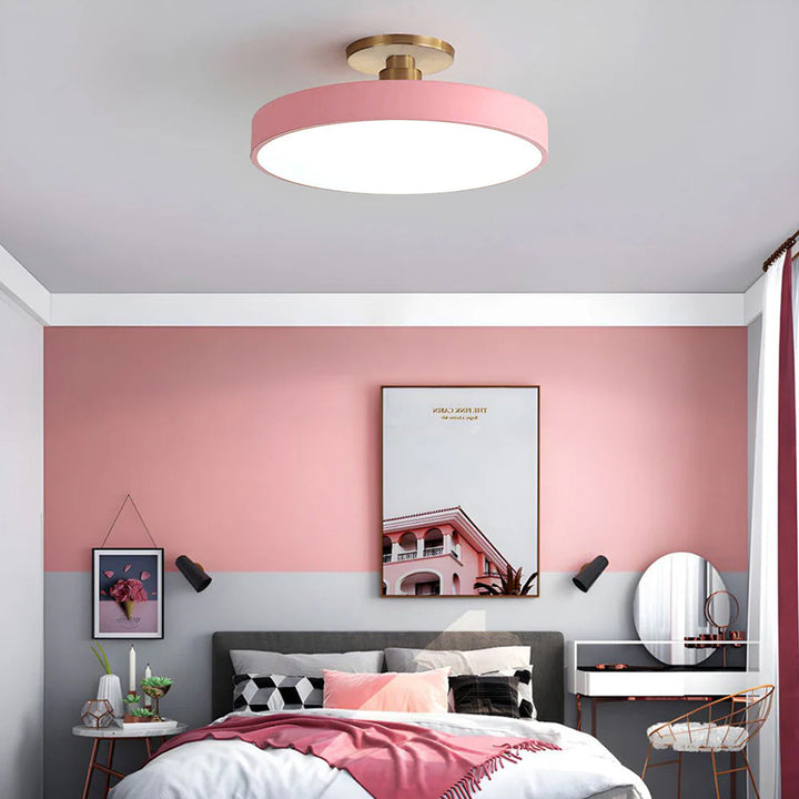Round LED ceiling light with acrylic shade for living and bedroom spaces