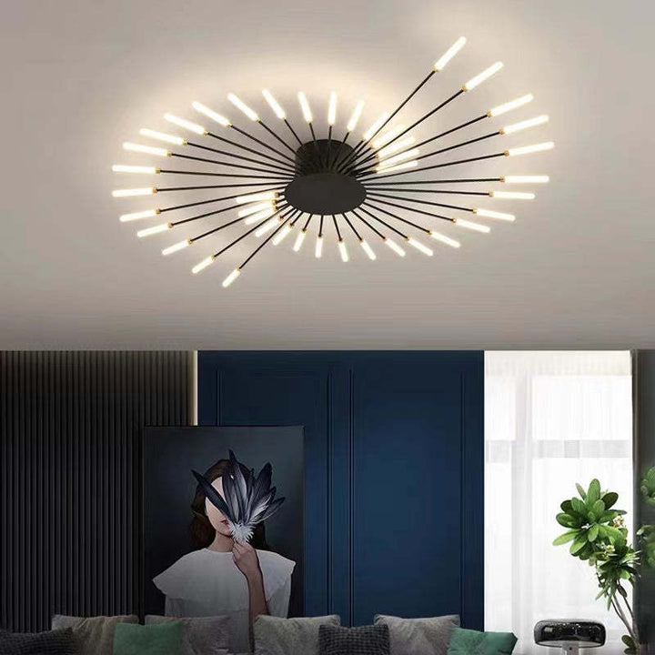 Modern firework-style LED ceiling light in gold and black