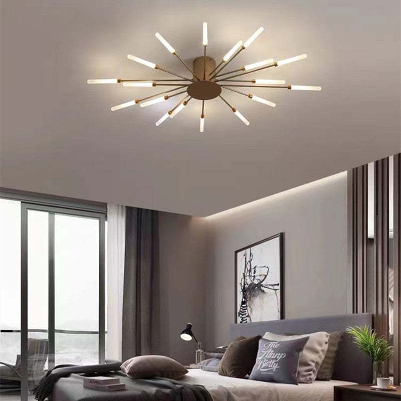 Modern firework-style LED ceiling light in gold and black