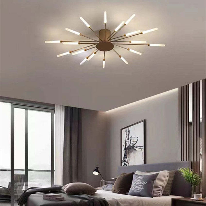 Modern firework-style LED ceiling light in gold and black