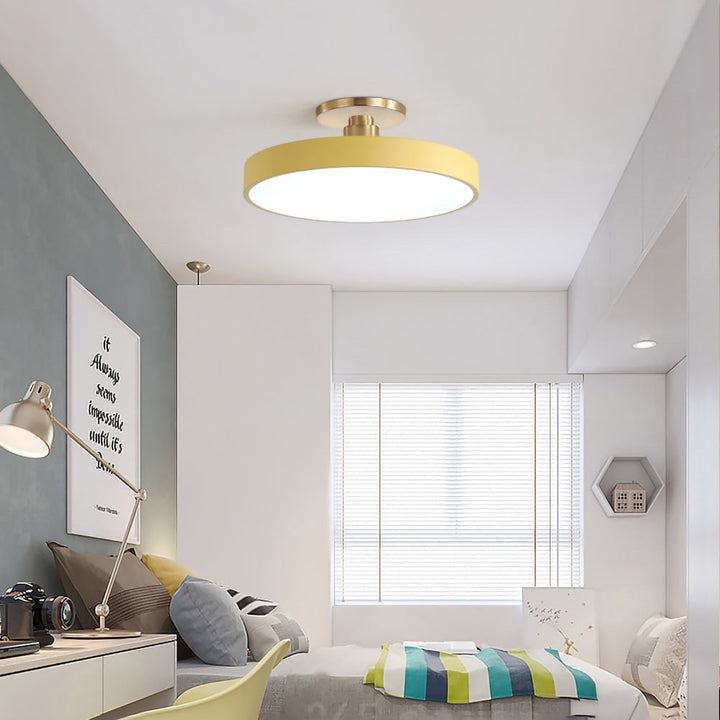 Round LED ceiling light with acrylic shade for living and bedroom spaces