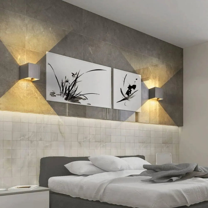 Minimalist aluminium wall light with warm or cool illumination
