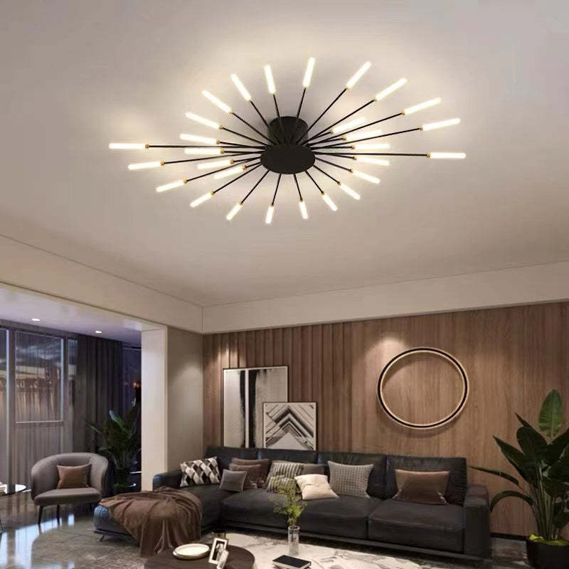 Modern firework-style LED ceiling light in gold and black