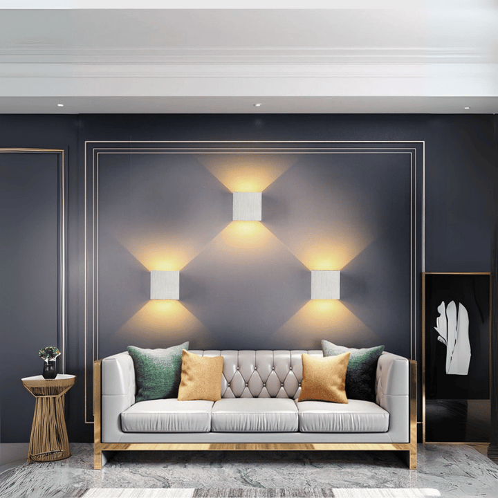 Minimalist aluminium wall light with warm or cool illumination