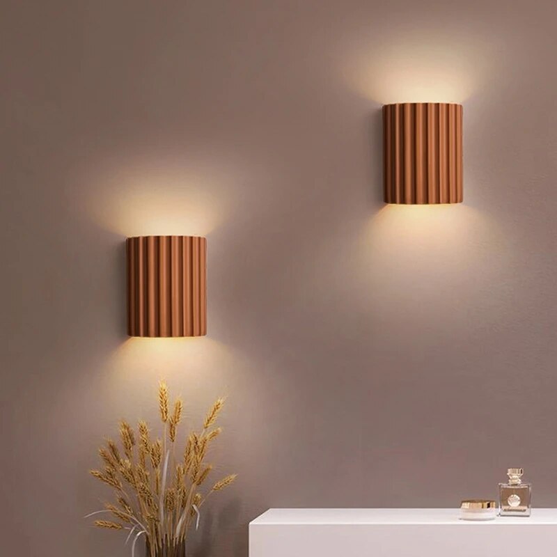 Modern resin wall light with sculptural design
