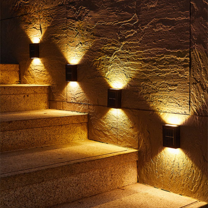 Solar-powered LED wall lights for garden and driveway