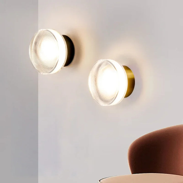 Modern circular LED wall light in black metal