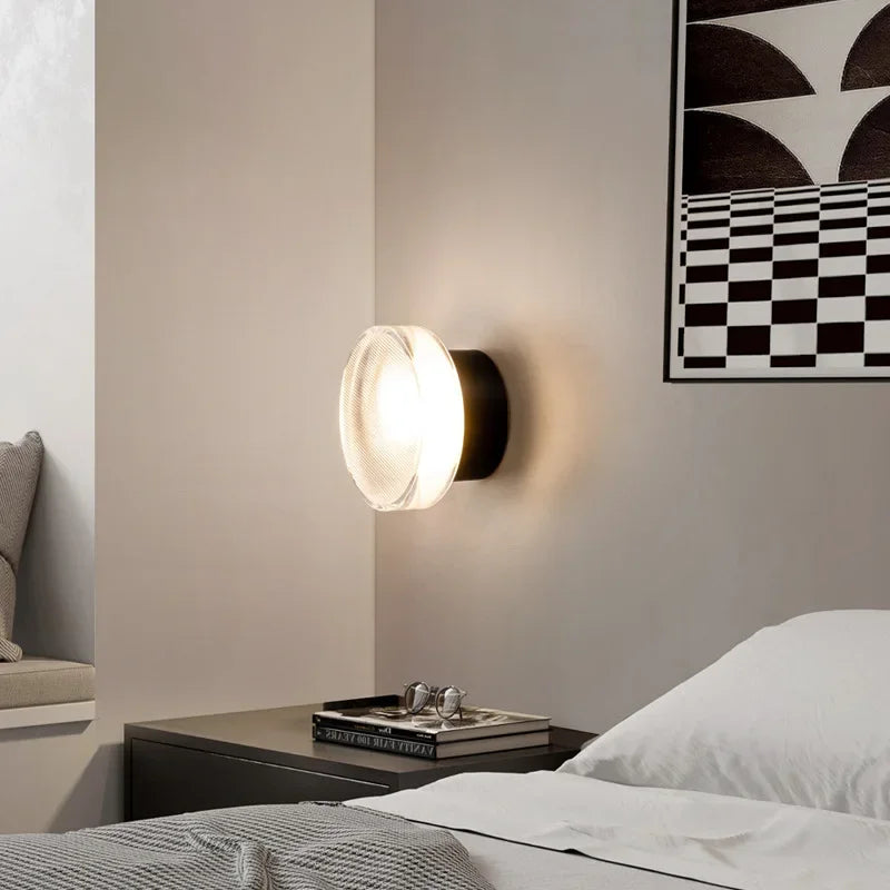 Modern circular LED wall light in black metal