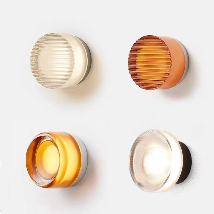 Modern circular LED wall light in black metal