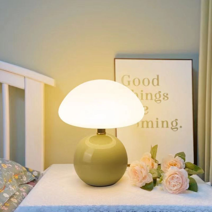 Cream mushroom-style table lamp with adjustable LED light
