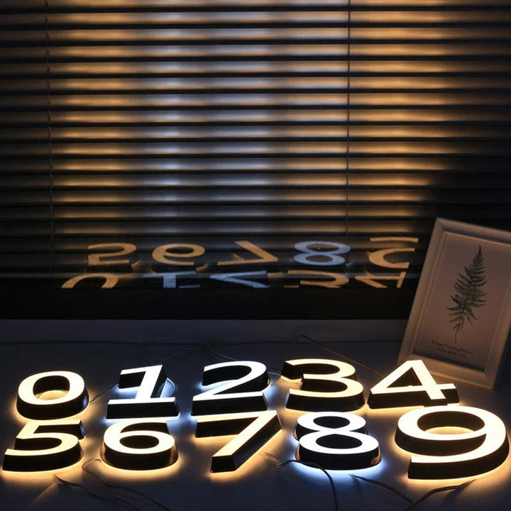 Modern illuminated house number wall light for outdoor entrances