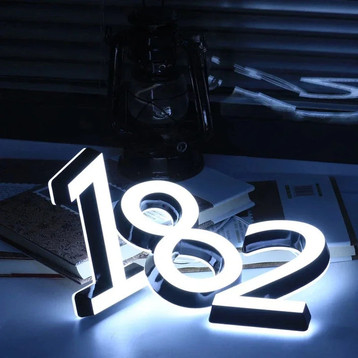 Modern illuminated house number wall light for outdoor entrances