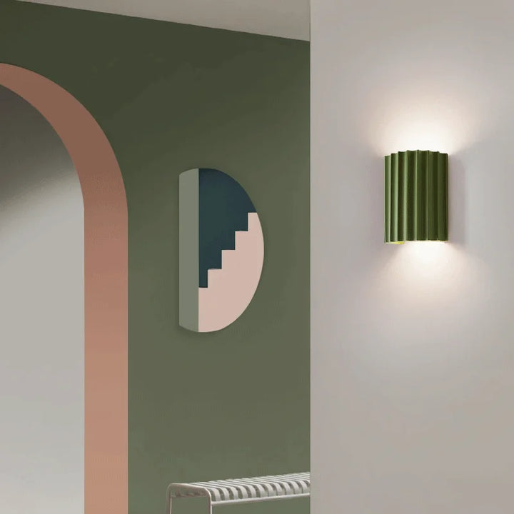 Modern resin wall light with sculptural design