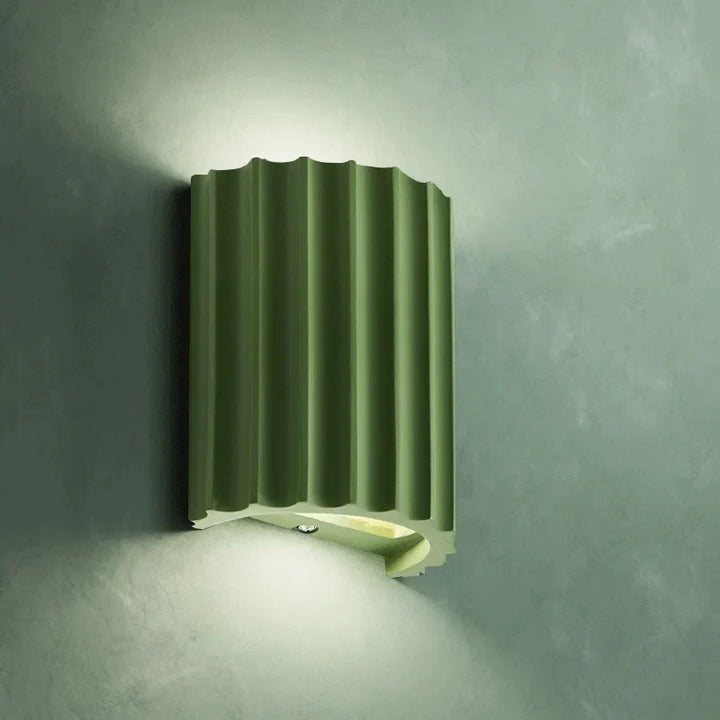 Modern resin wall light with sculptural design