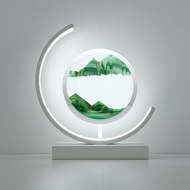 Quicksand LED table lamp with rotating sand art design