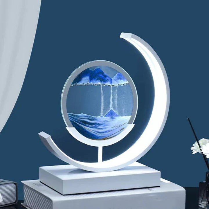 Quicksand LED table lamp with rotating sand art design