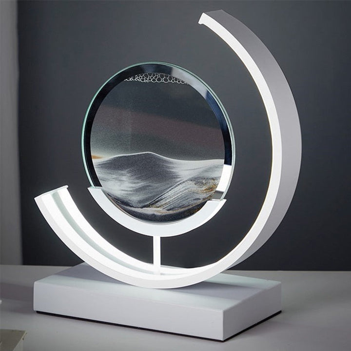 Quicksand LED table lamp with rotating sand art design