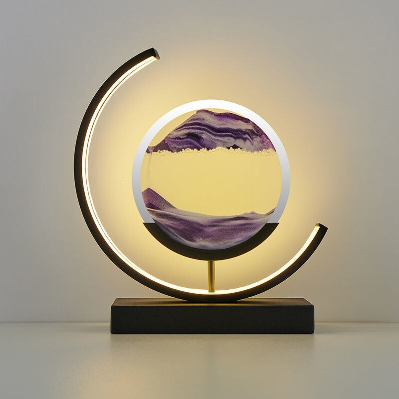 Quicksand LED table lamp with rotating sand art design