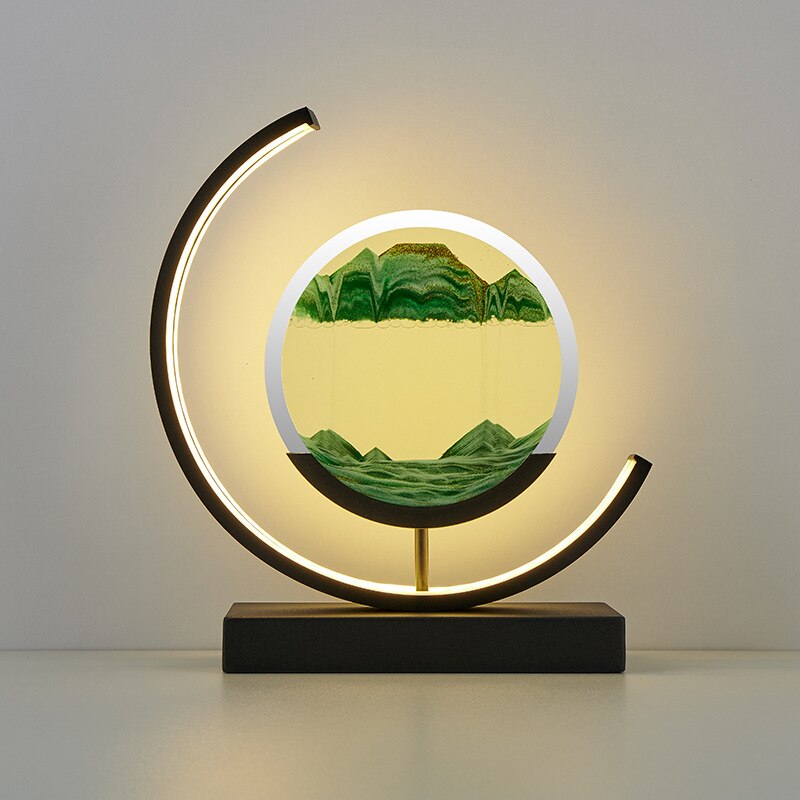 Quicksand LED table lamp with rotating sand art design