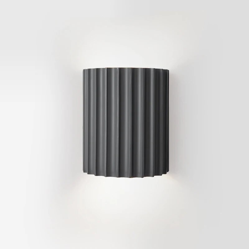 Modern resin wall light with sculptural design