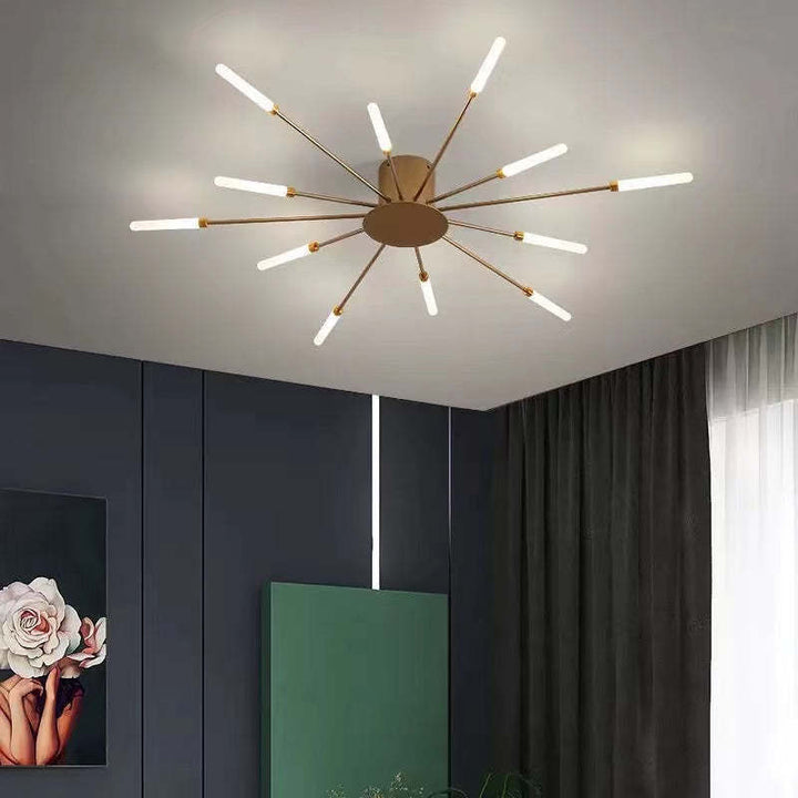 Modern firework-style LED ceiling light in gold and black
