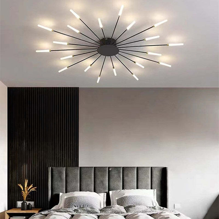 Modern firework-style LED ceiling light in gold and black