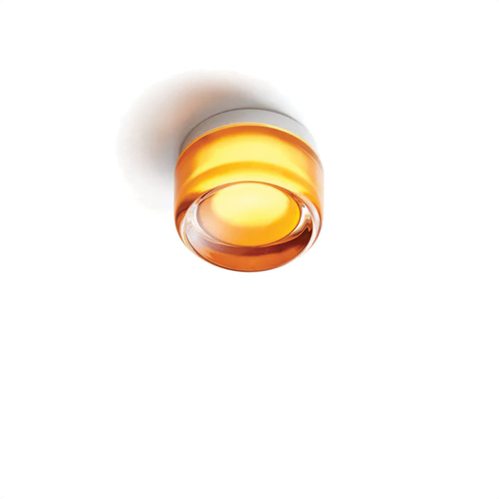 Elegant black and gold wall light with dimpled glass shade