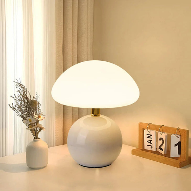 Cream mushroom-style table lamp with adjustable LED light