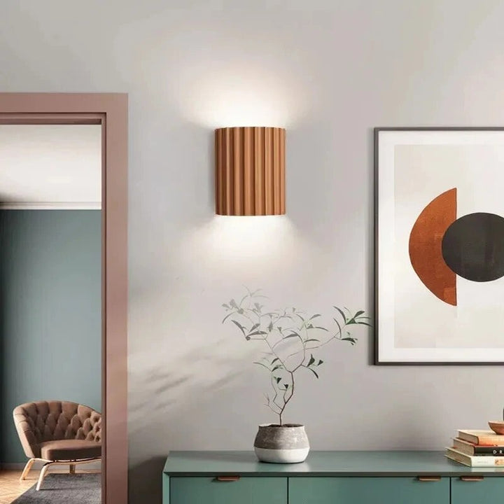 Modern resin wall light with sculptural design