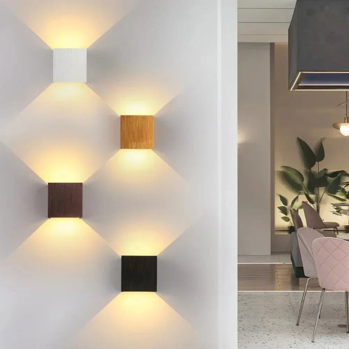 Minimalist aluminium wall light with warm or cool illumination