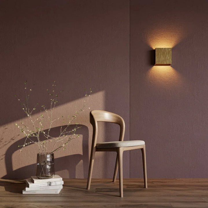 Minimalist aluminium wall light with warm or cool illumination