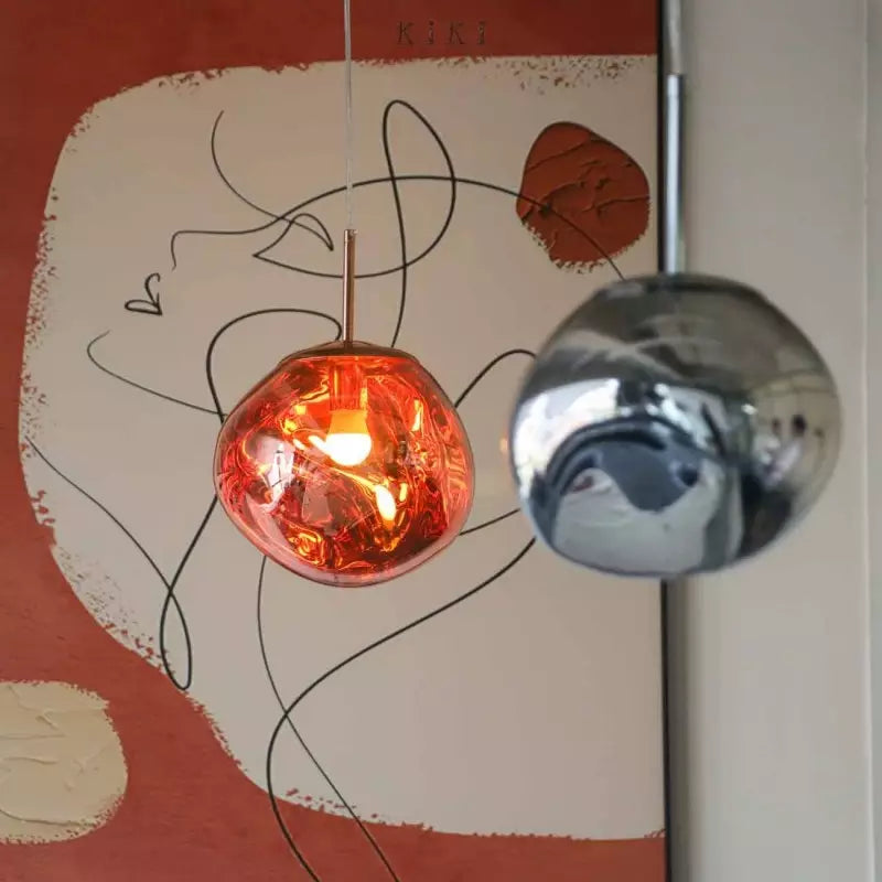 Modern reflective pendant light with melting design