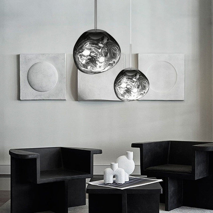 Modern reflective pendant light with melting design