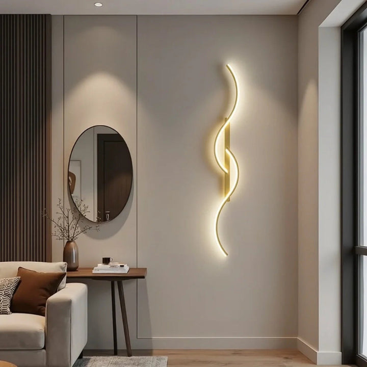 Wave-shaped dimmable LED wall light in gold and black