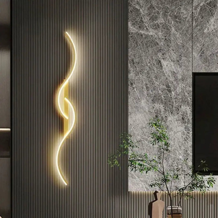 Wave-shaped dimmable LED wall light in gold and black