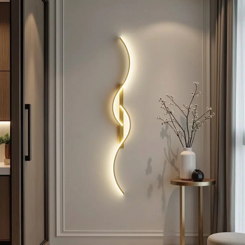 Wave-shaped dimmable LED wall light in gold and black