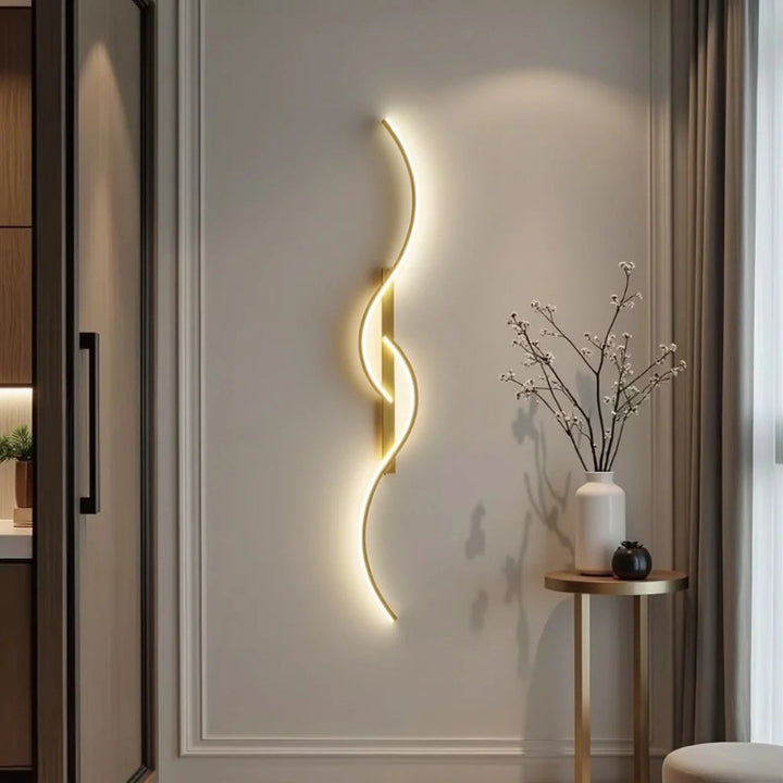 Wave-shaped dimmable LED wall light in gold and black